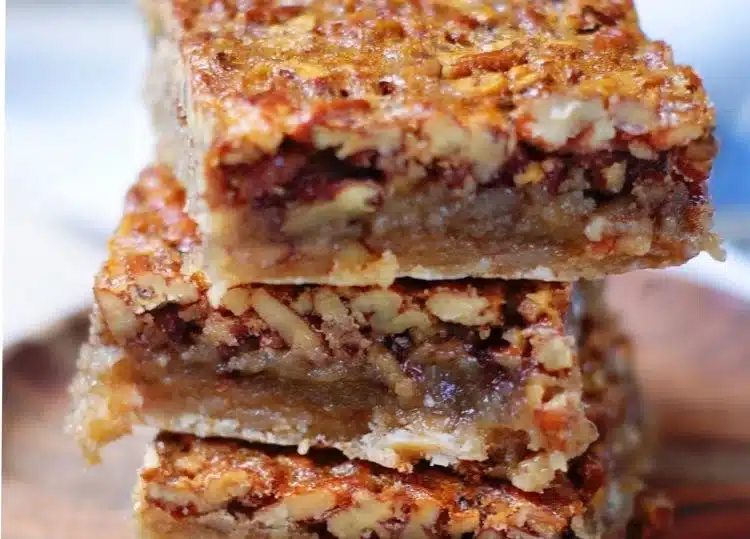 Best ever pecan pie bars with a rich and nutty topping on a buttery crust.