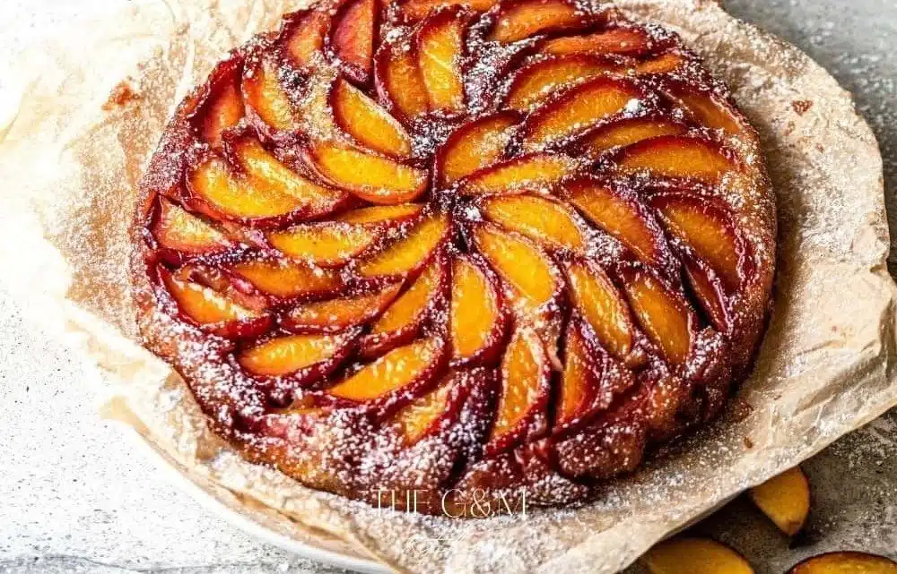 Bourbon Peach Upside Down Cake topped with fresh peaches and caramel