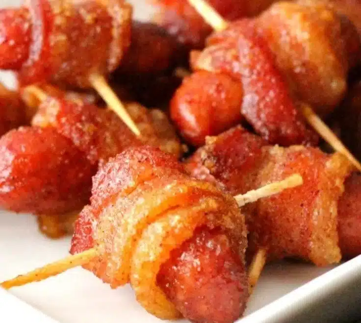 Brown sugar bacon-wrapped smokies on a serving platter