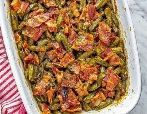 Plate of delicious Crack Green Beans recipe with seasoning and toppings