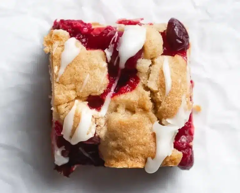 Cranberry Crumble Bars topped with browned butter blondie, perfect dessert.