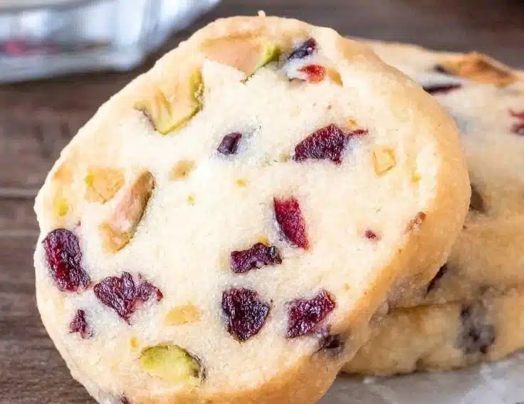 Delicious Cranberry Pistachio Shortbread cookies arranged on a festive plate