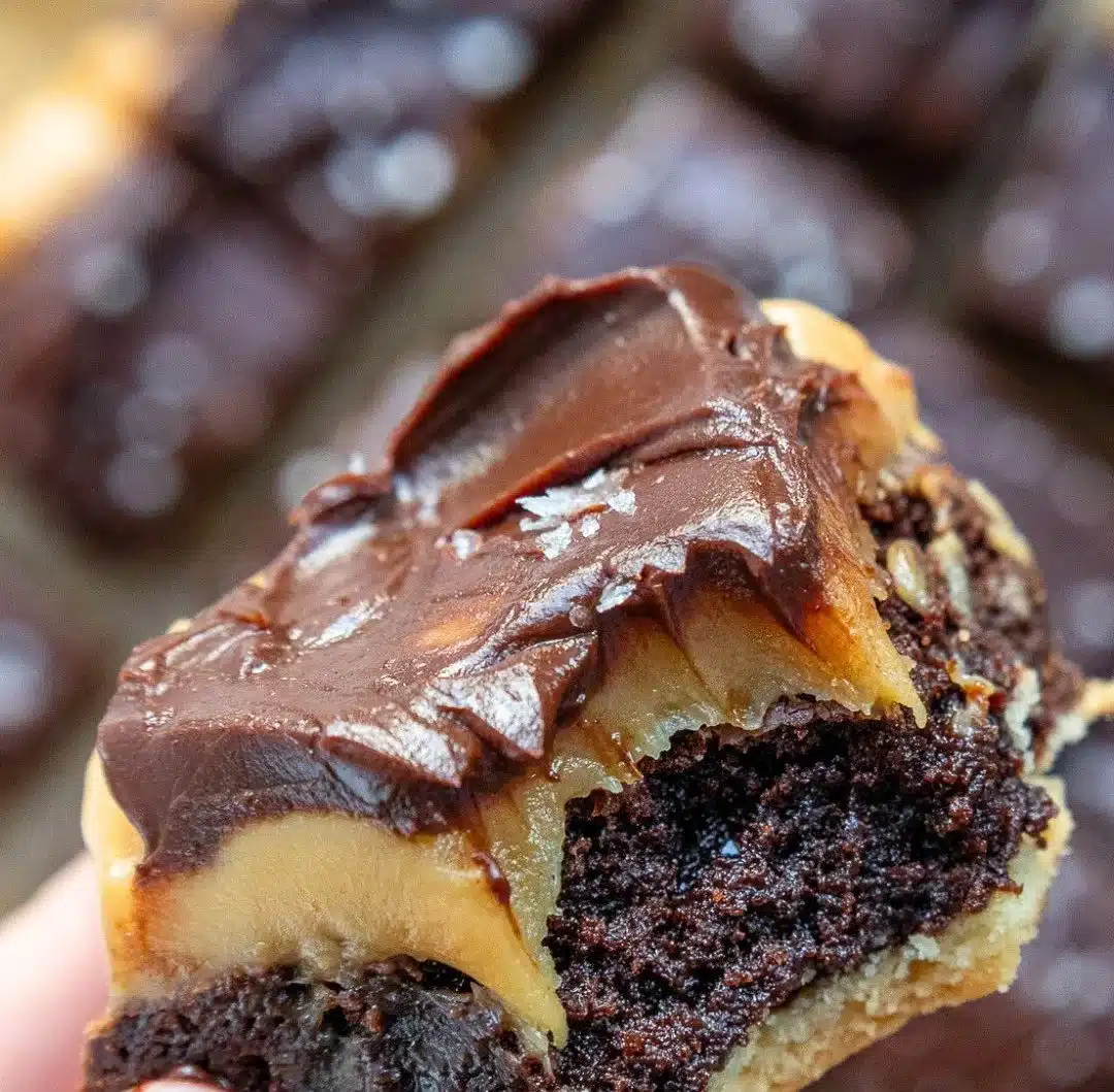 Decadent millionaire-style brownies topped with chocolate and caramel