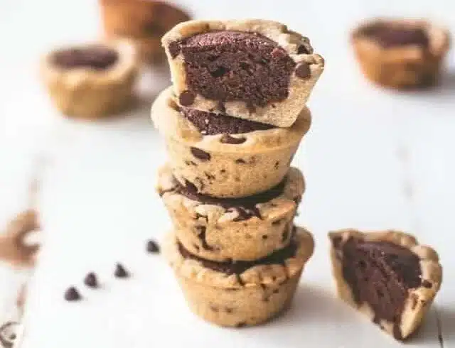 Delicious bite-sized brownie tarts served on a decorative plate