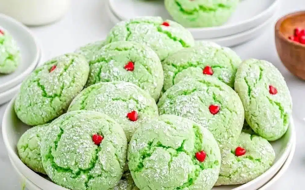 Plate of easy Grinch cookies decorated for Christmas