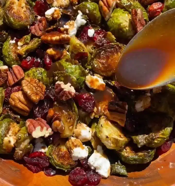 Maple balsamic roasted Brussels sprouts served on a festive Thanksgiving table.