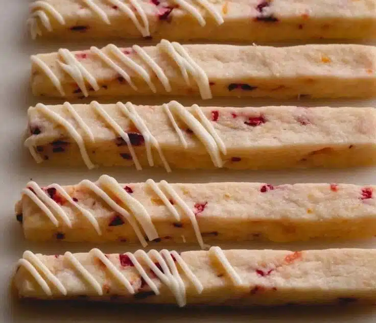 Orange Cranberry Shortbread Cookies on a decorative plate